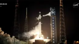 SpaceX Falcon 9 rocket launching Crew Dragon