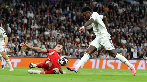 فينيسيوس جونيور وأوتاميندي لاعبا ريال مدريد وبنفيكا (Getty)